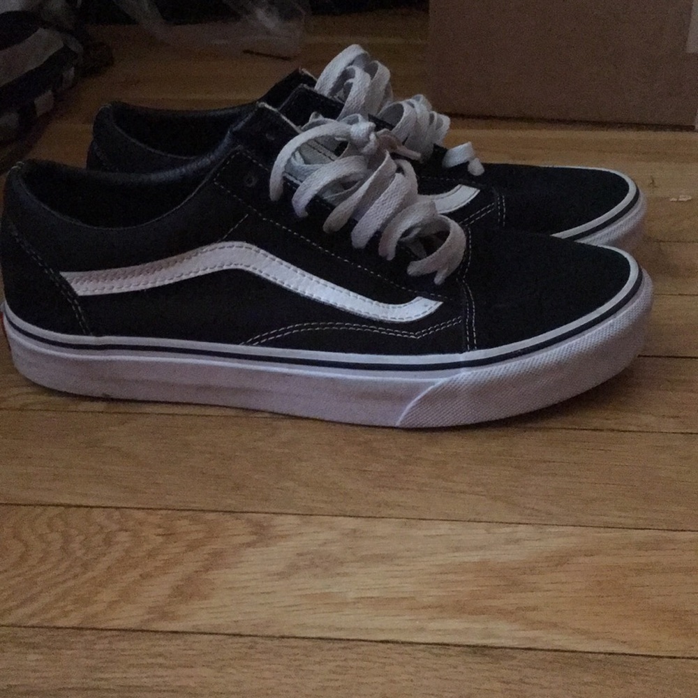 Black and white vans in a size 8